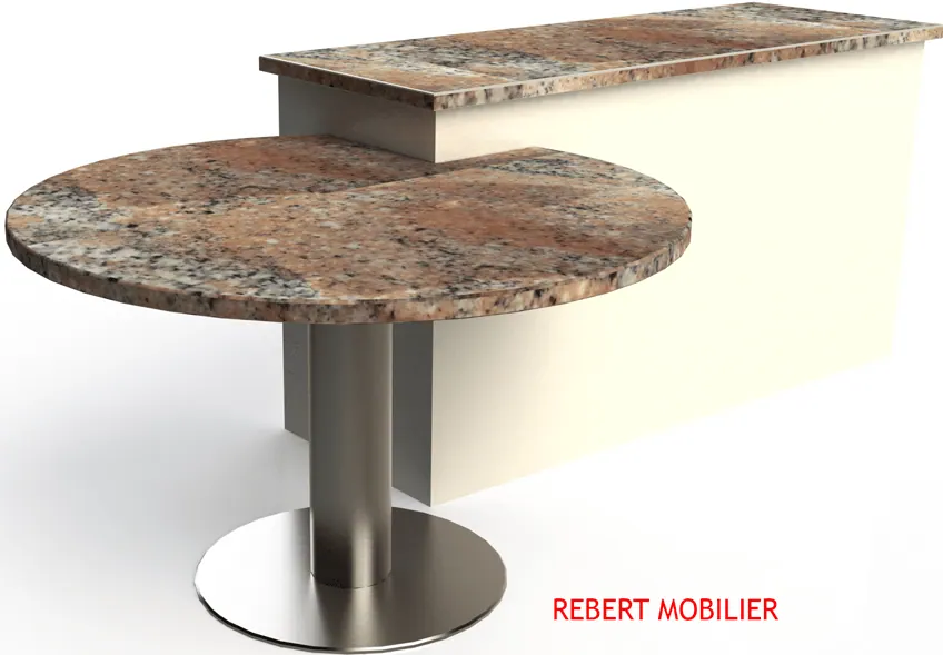 Table de cuisine dans un angle non d'équerre. Plateau en granit rond de Ø 120 cm, piétement inox brossé, installé autour d'un angle qui n'est pas d'équerre.